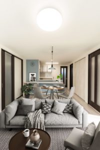 藍鼠色のアクセントクロスが映えるリビング